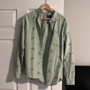 Dinosaurs pattern green shirt